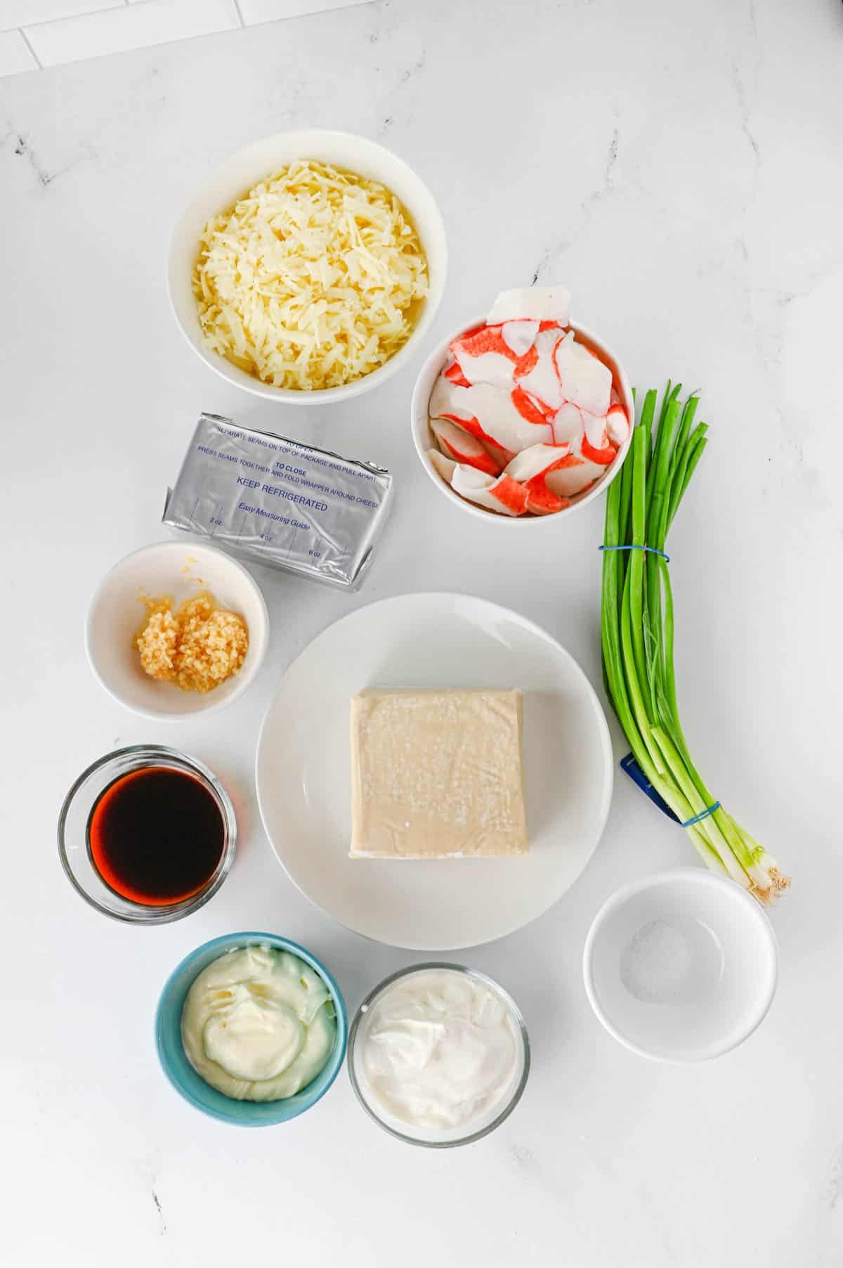 crab rangoon dip ingredients on the kitchen counter