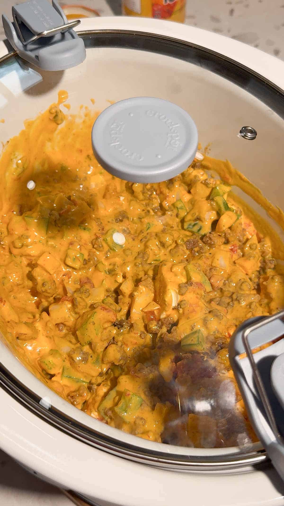 nacho mixture cooking in a crock pot
