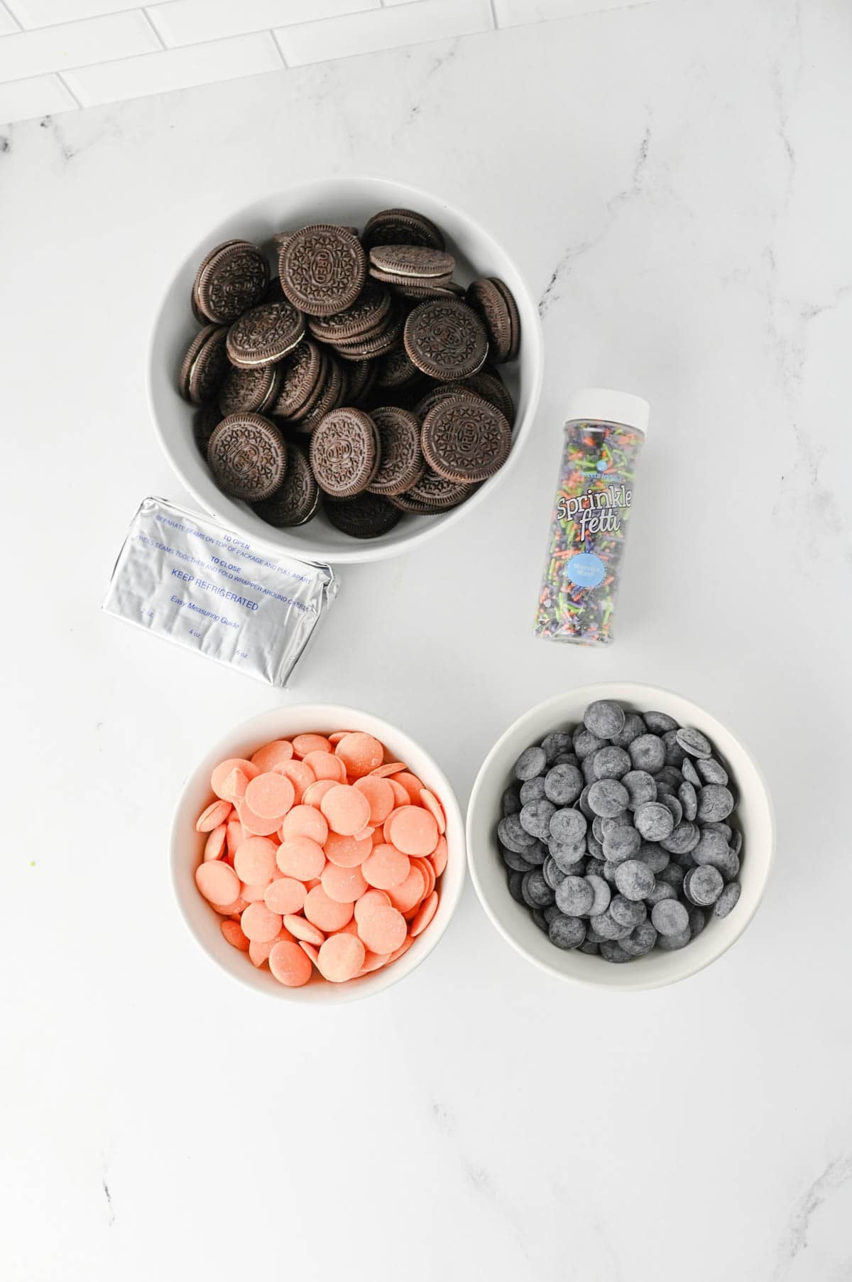 halloween oreo ball ingredients on the kitchen counter
