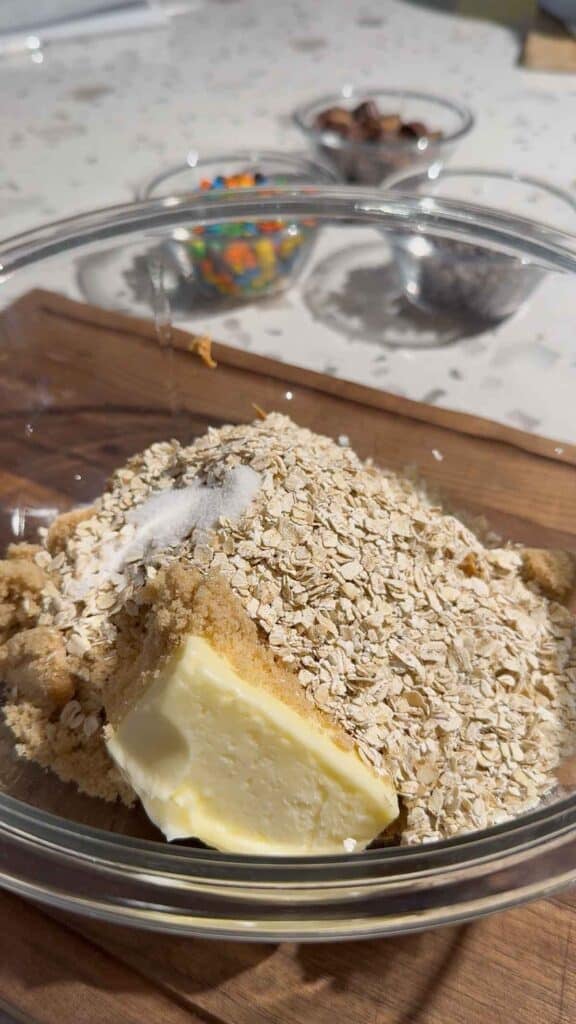 salt, quick oats, butter, brown sugar and peanut butter in a mixing bowl