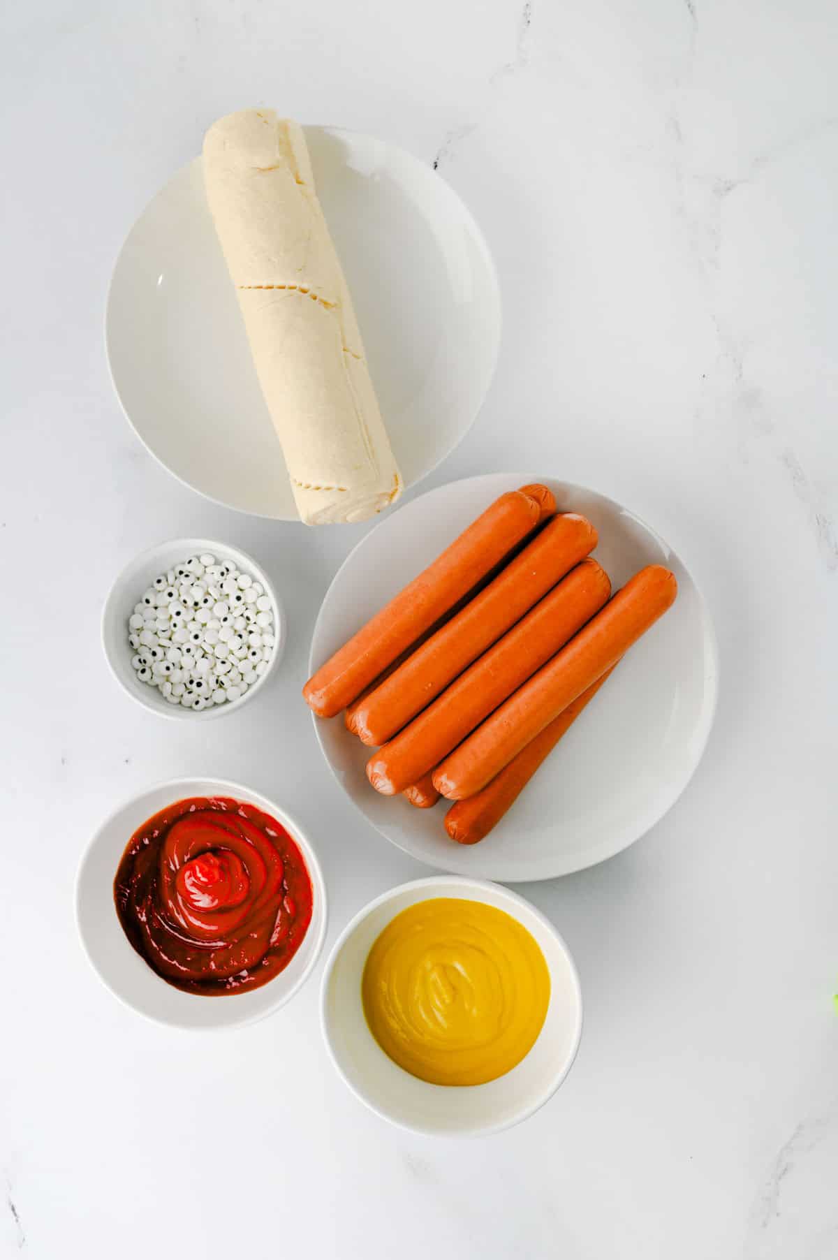 mummy hot dogs ingredients on the kitchen counter