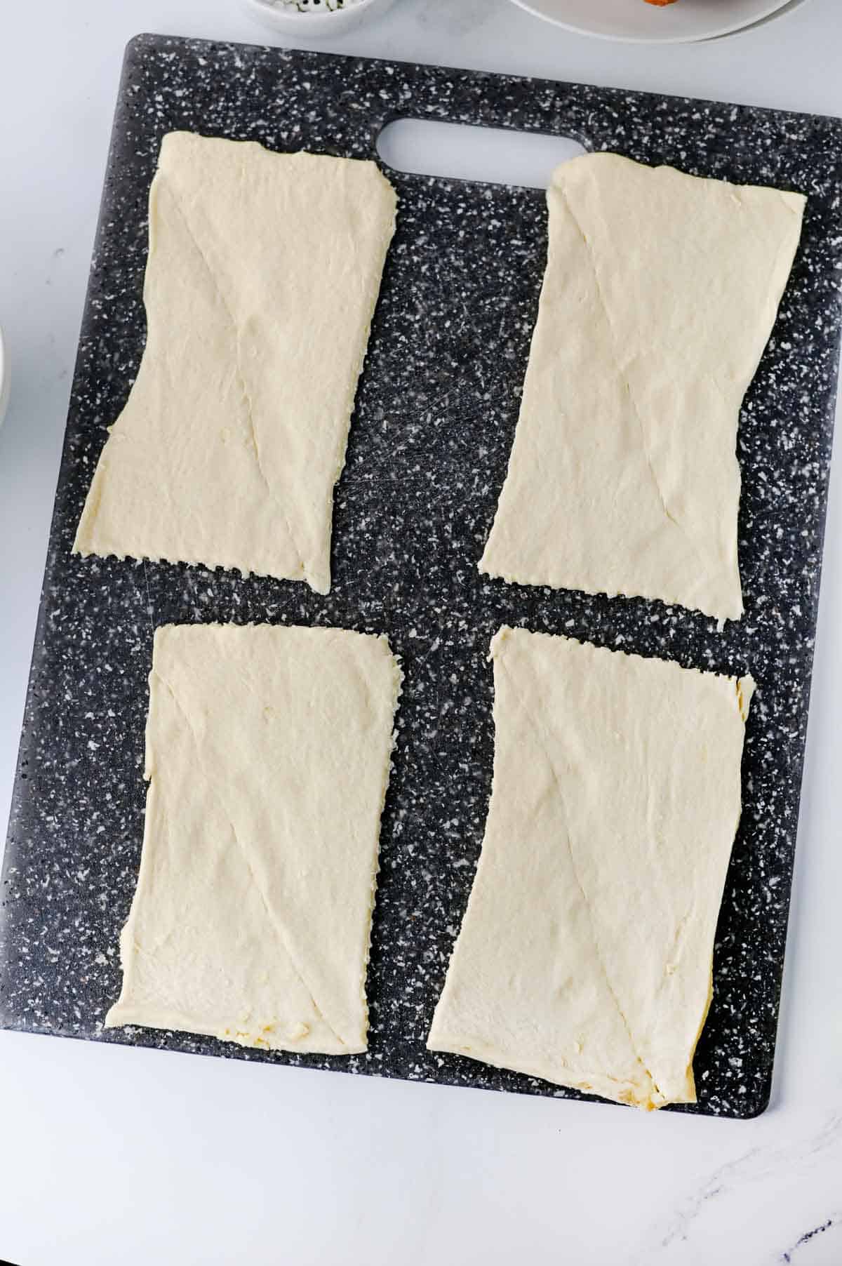 crescent roll dough cut into 4 rectangles