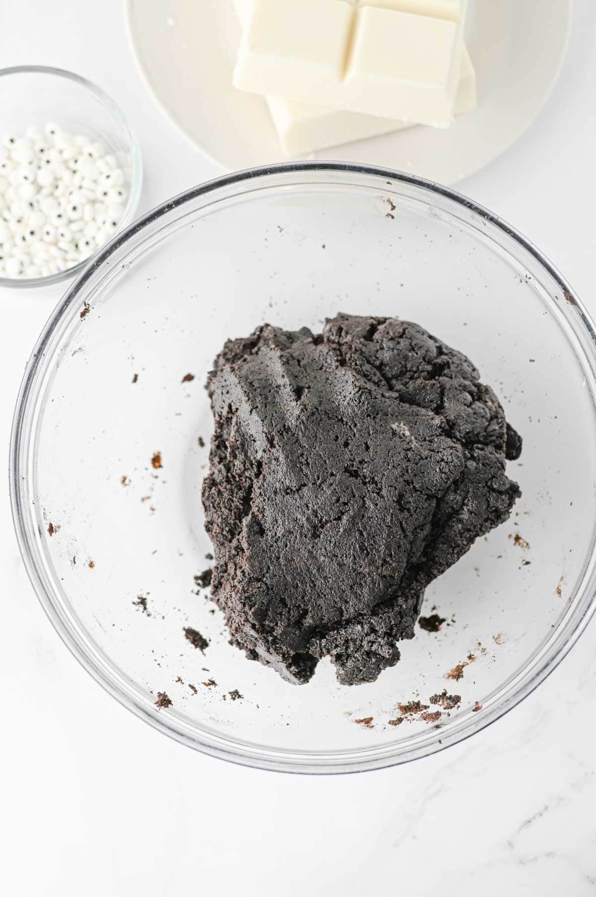 cream cheese and oreo crumb mixture in a mixing bowl