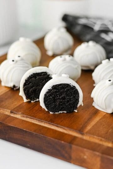 These Mummy Oreo Balls are the ultimate spooky treat for Halloween parties, dessert tables, and school celebrations! Made with crushed Oreo cookies, cream cheese, vanilla almond bark, and candy eyes, this easy Mummy Oreo Balls Recipe is a fun No Bake Halloween Treat that everyone will love. If you're searching for Halloween Oreo Desserts, Mummy Oreo Truffles, Halloween Oreo Balls, Easy Halloween Treats For Kids, or Halloween Dessert Ideas Easy enough for busy days, these cute bites are perfect. The white chocolate mummy wrapping and silly candy eyes make them an adorable Halloween Party Food idea. Add these Oreo Mummy Balls to your list of Halloween Desserts No Bake, Spooky Treats, Halloween Goodies, and Easy Halloween Desserts For Parties for a sweet treat everyone will grab!