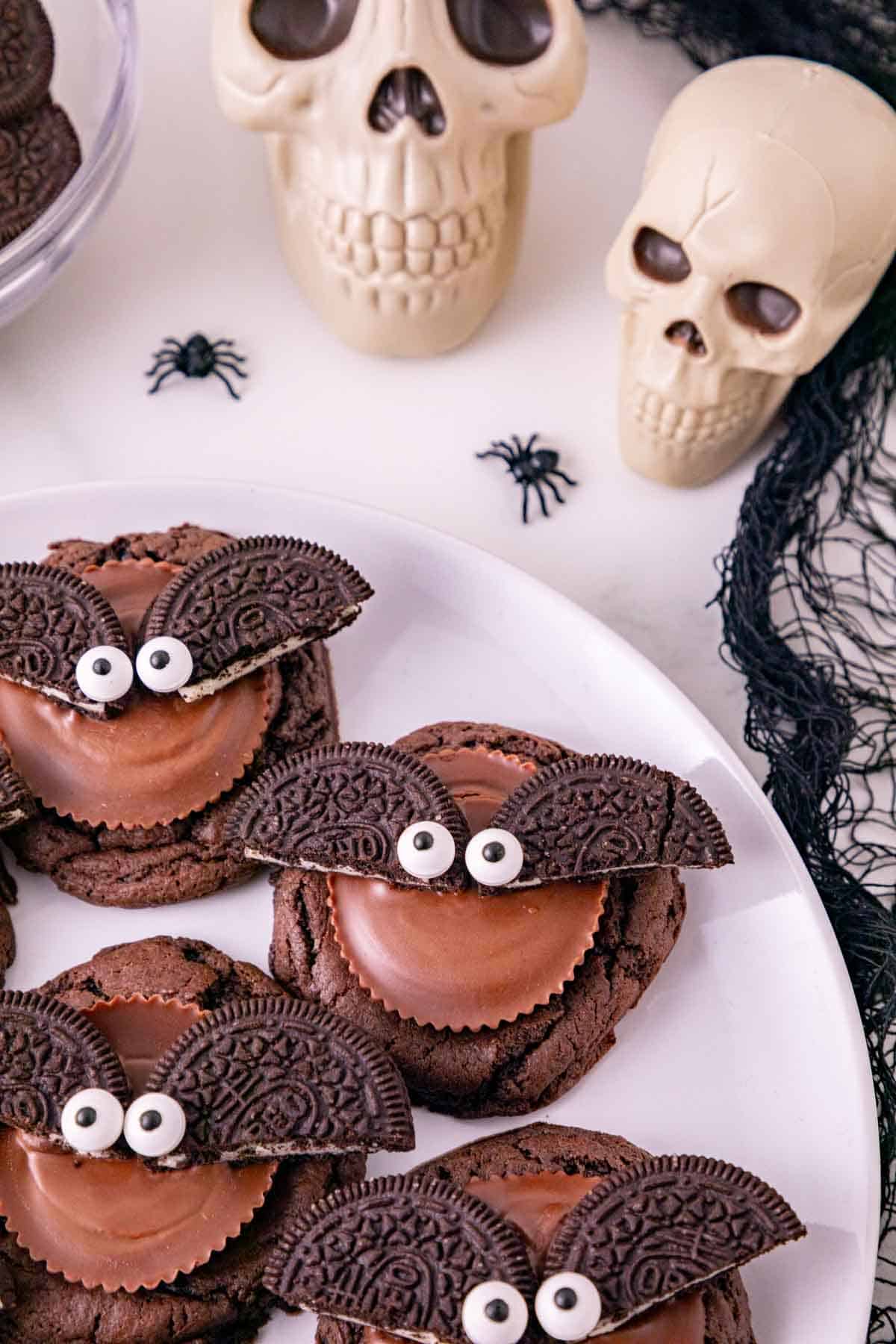 chocolate cookies topped with oreo bats