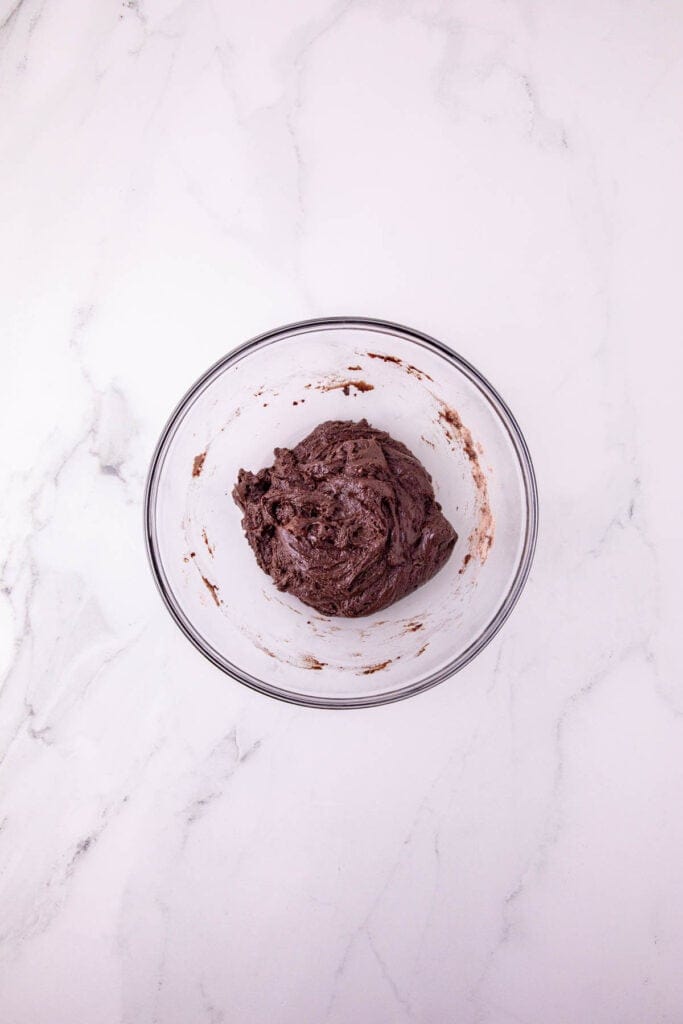 chocolate cookie dough in a mixing bowl