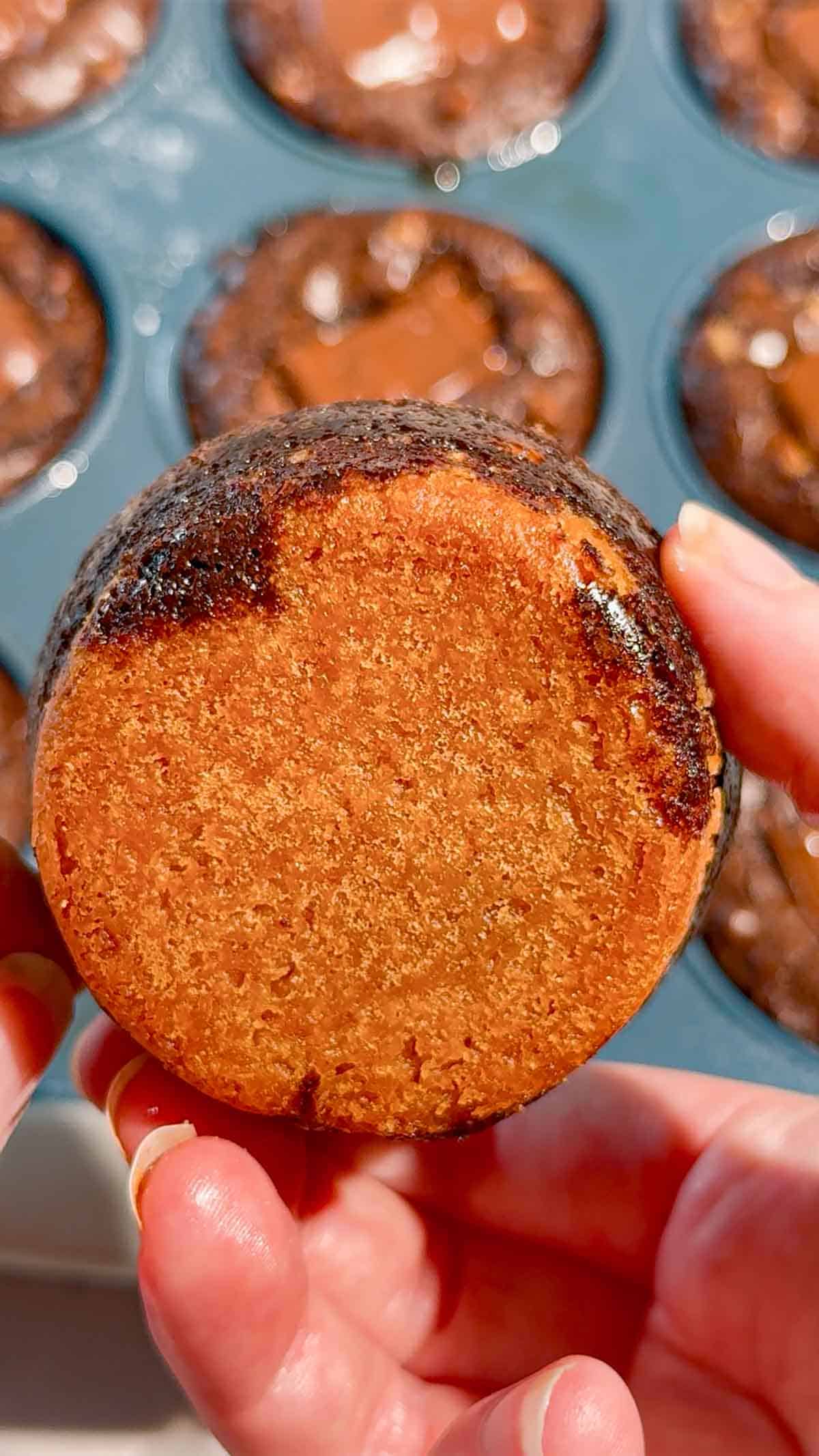 Reese's Stuffed Peanut Butter Brookies are the ultimate dessert for chocolate and peanut butter lovers! These easy muffin tin brookies start with Pillsbury peanut butter cookie dough, then get loaded with Reese's Peanut Butter Cups, Reese's brownie batter and pieces of Reese's peanut butter bar. Ready in just 33 minutes, this easy brookie recipe is perfect for parties, potlucks, holidays or whenever you need an indulgent treat. Save this recipe if you love Reese's desserts, peanut butter cup recipes, brownie cookie desserts, stuffed brookies, easy brownie mix recipes and muffin tin desserts. Every bite has a chewy peanut butter cookie base, a gooey candy center and a fudgy brownie top. These brownie cups are easy to serve and packed with chocolate peanut butter flavor!