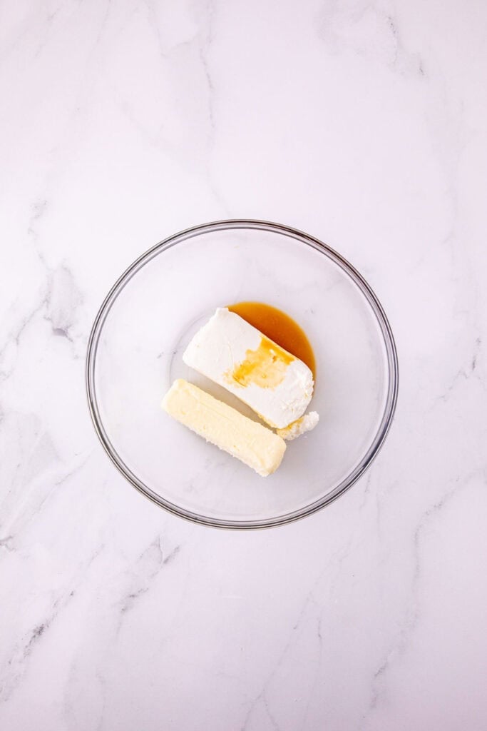 cream cheese, butter and vanilla extract in a mixing bowl