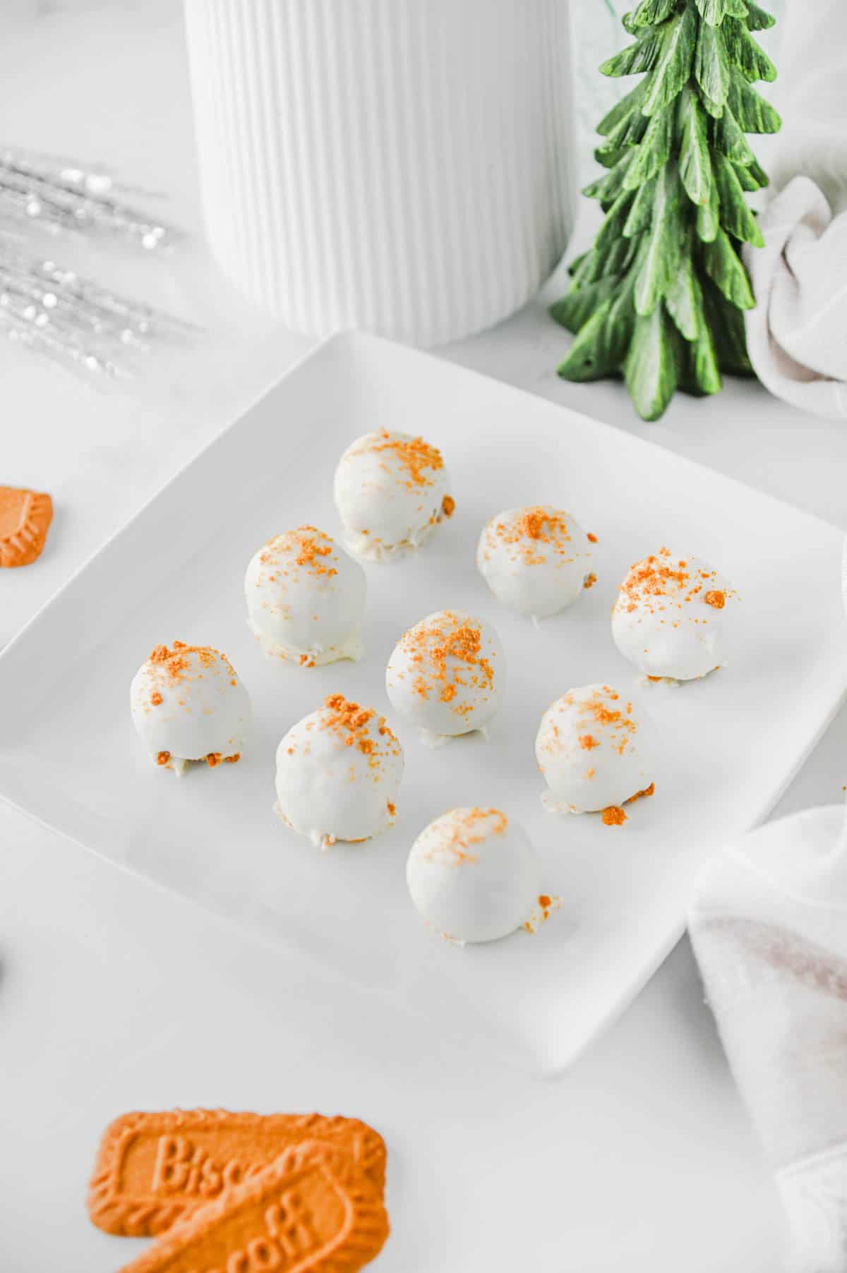 no bake biscoff truffles on a serving plate for christmas