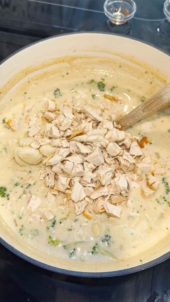 gnocchi and chopped chicken added to creamy broccoli soup