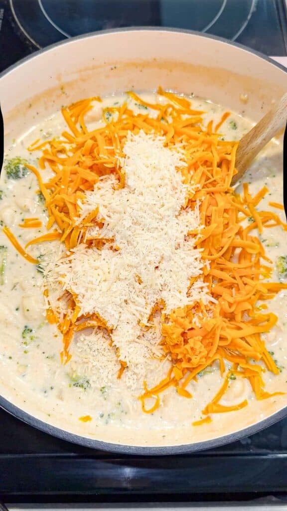shredded parmesan and cheddar added to broccoli soup