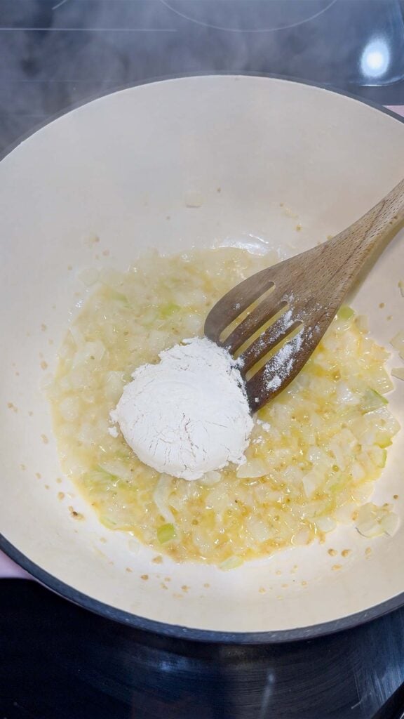 flour added to pot with butter and diced onions
