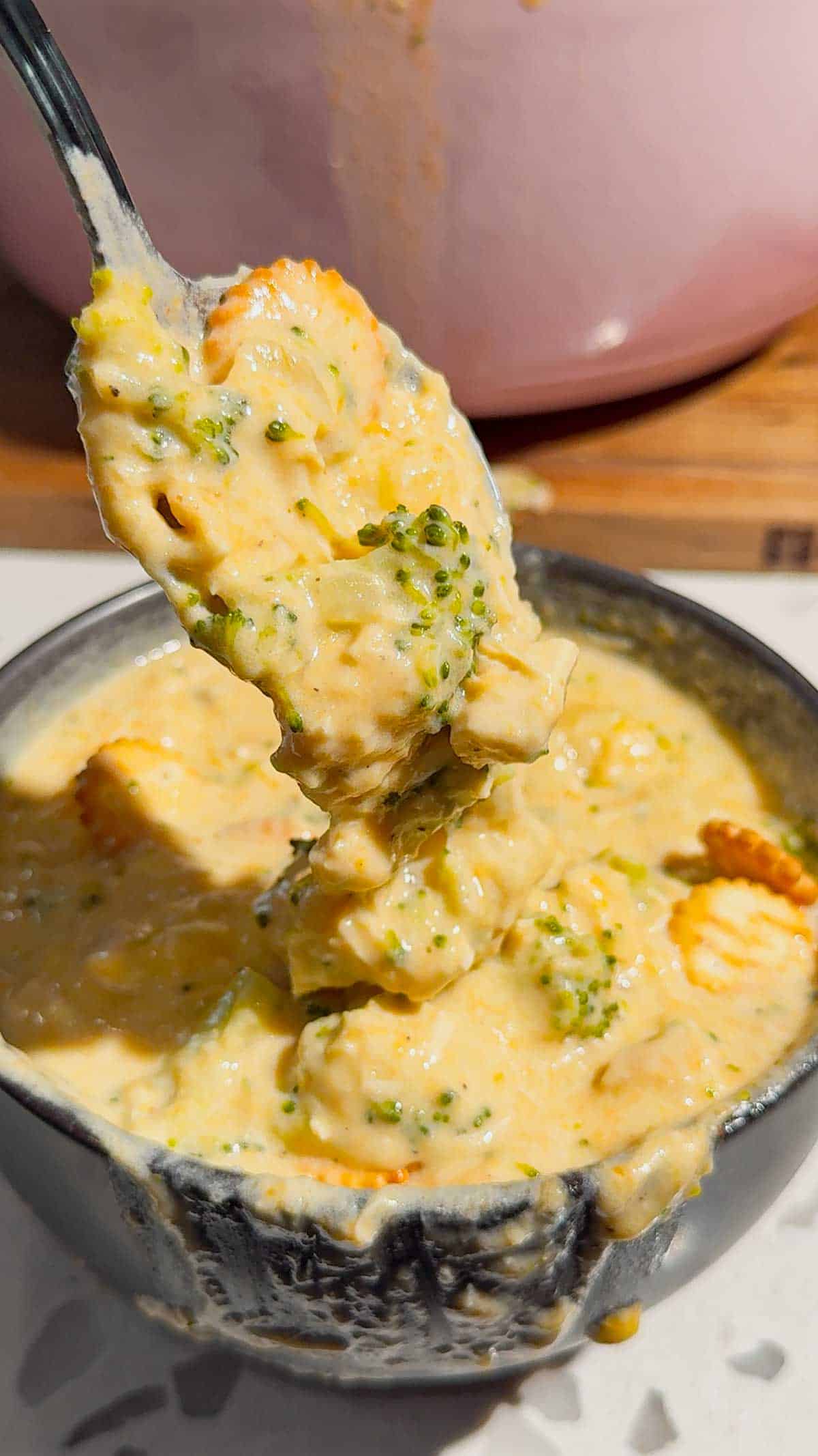 spoon of broccoli cheddar chicken gnocchi soup
