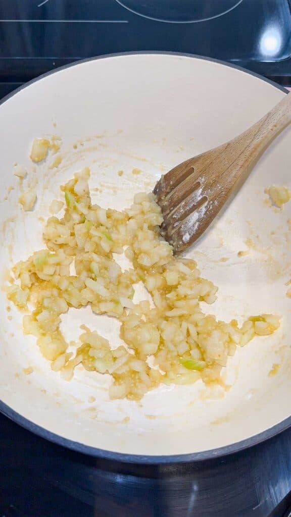 flour, butter and onion mixture cooking in a pot