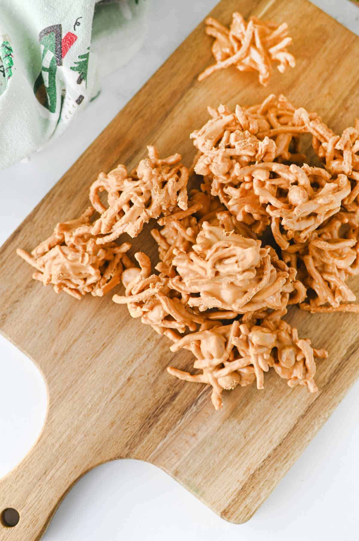 stack of butterscotch haystacks on serving board