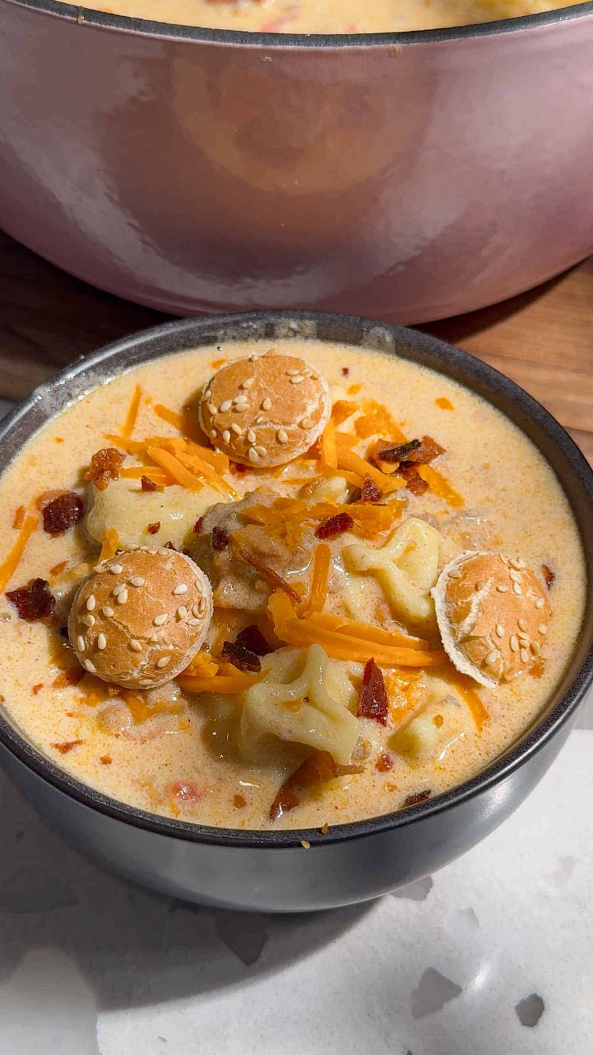 cheeseburger soup in a bowl topped with croutons