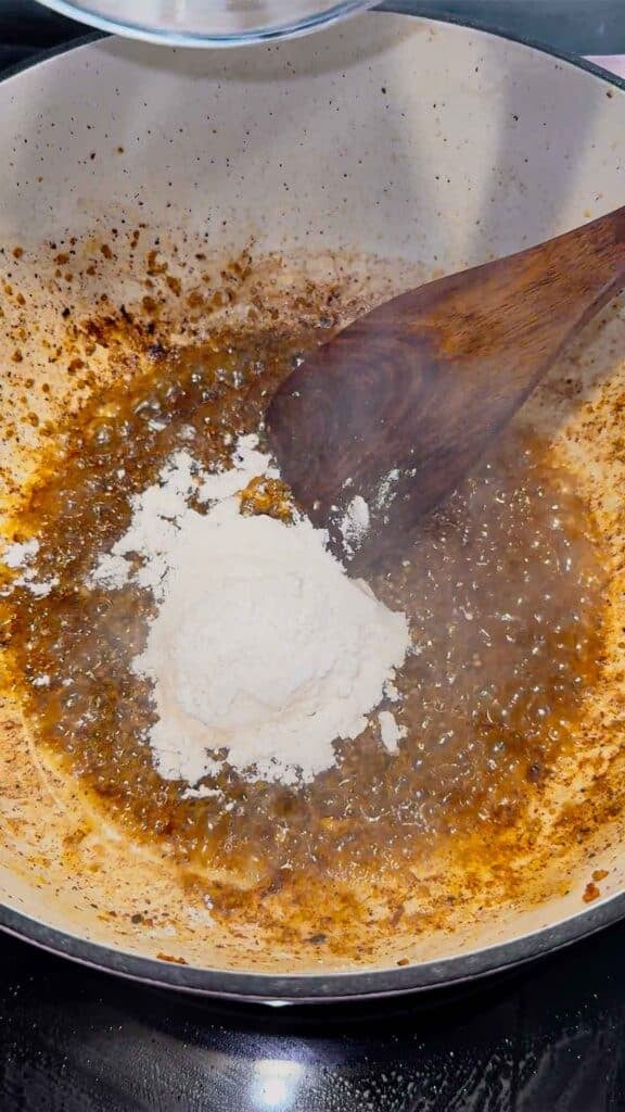 flour added to pot with melted butter and chopped garlic