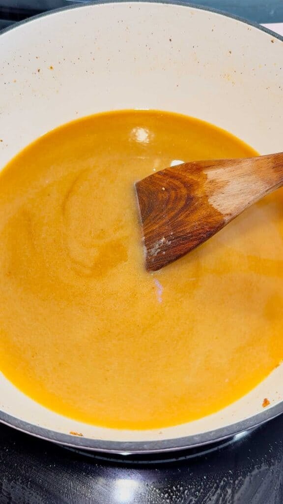chicken broth added to dutch oven