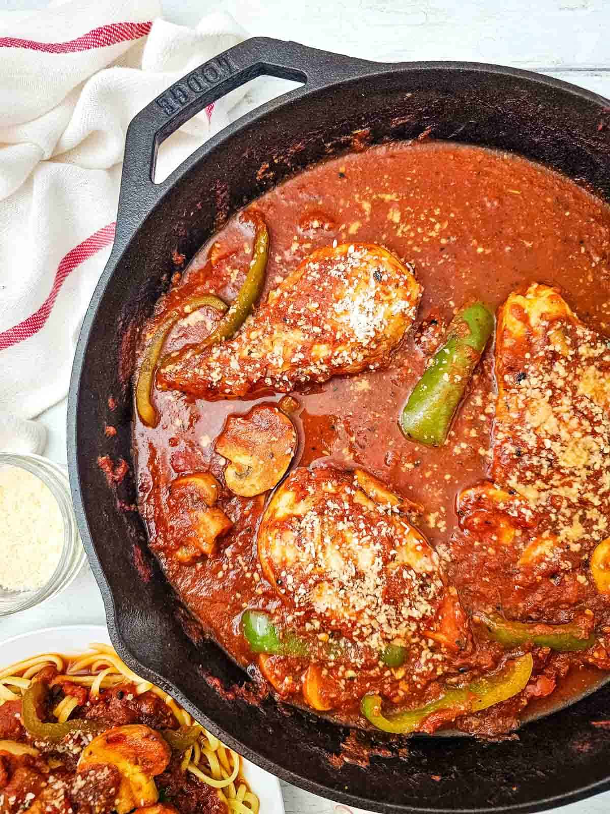 skillet of chicken cacciatore on the kitchen counter