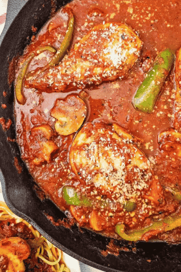 This easy Chicken Cacciatore recipe is a hearty Italian inspired dinner made with chicken breasts, mushrooms and green peppers simmered in a rich tomato sauce with garlic, Italian seasoning and Parmesan cheese. Ready in just 50 minutes, this skillet chicken dinner is perfect for busy weeknights and family meals. Serve this chicken breast recipe over pasta, noodles or rice to soak up every bite of the delicious sauce. If you love easy chicken recipes, comforting Italian chicken dinners and simple family dinner ideas, save this homemade chicken cacciatore for your next meal plan. With simple ingredients and plenty of flavour, this chicken and tomato sauce recipe is an easy way to bring comfort food to the dinner table. Save this recipe for dinner!