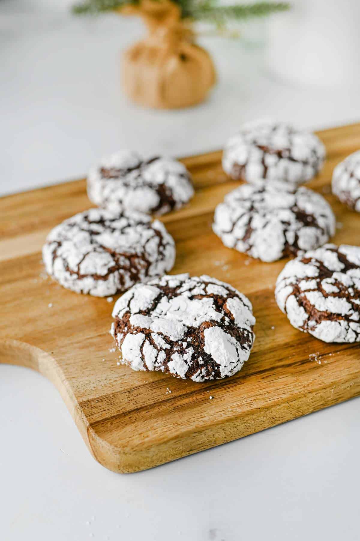 chocolate crinkle cookies on a cutting board