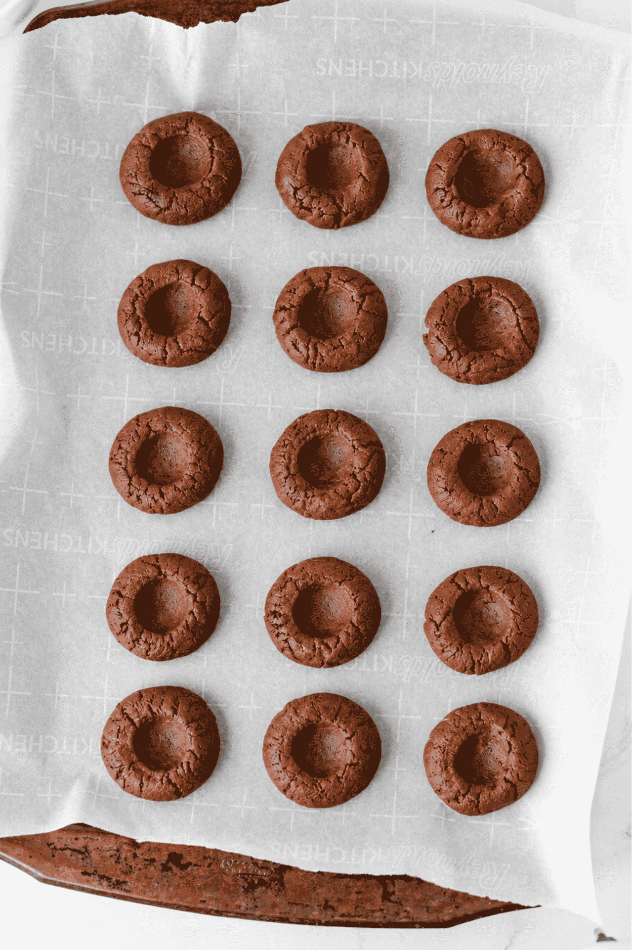 chocolate thumbprint cookies after baking