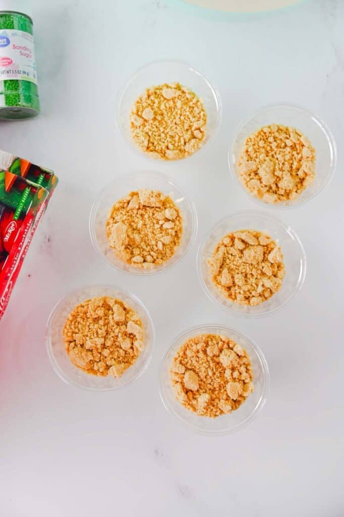 crumbled golden Oreos in individual cups