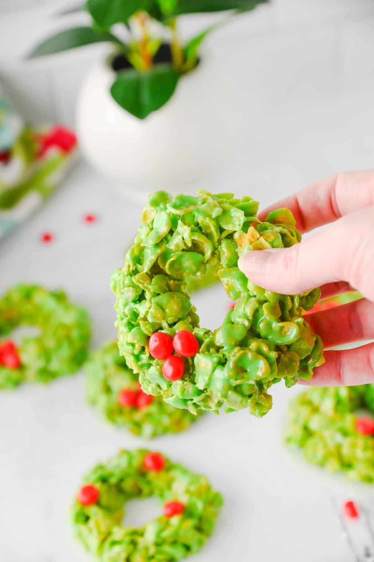 hand holding a cornflake wreath