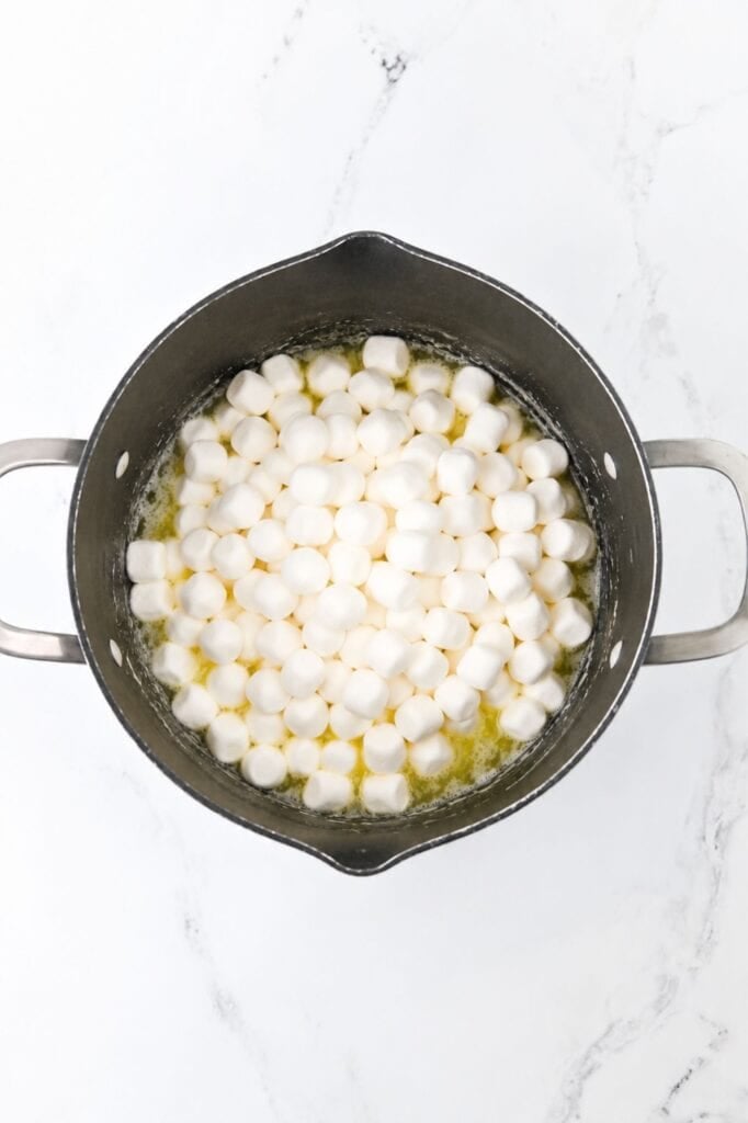 mini marshmallows and melted butter in a large pot