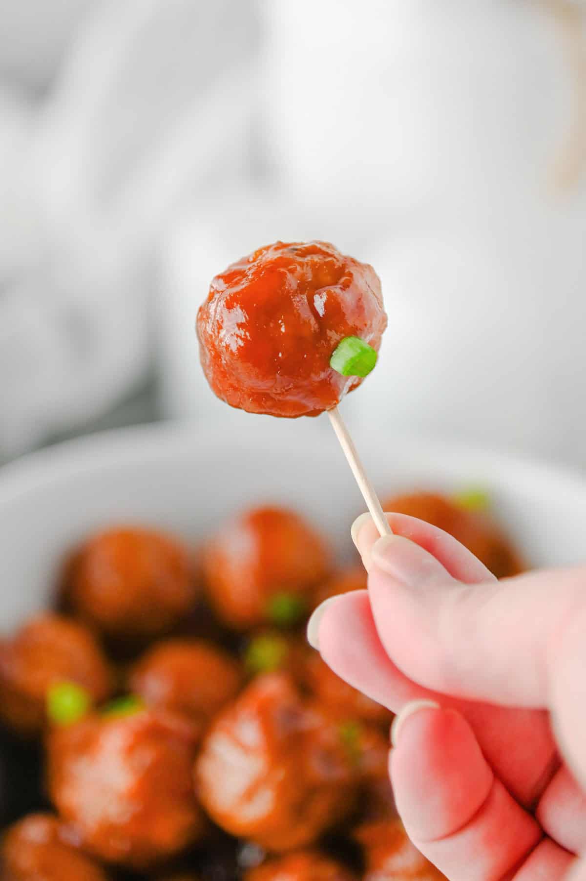 toothpick with cranberry meatball