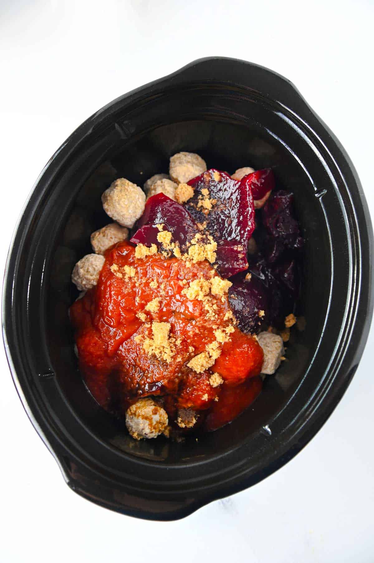 cranberry sauce, brown sugar and chili sauce in a slow cooker