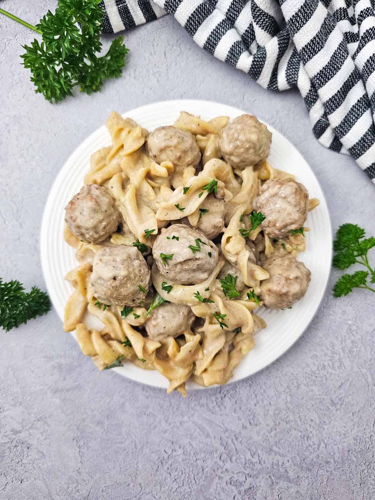swedish meatballs and noodles on a plate