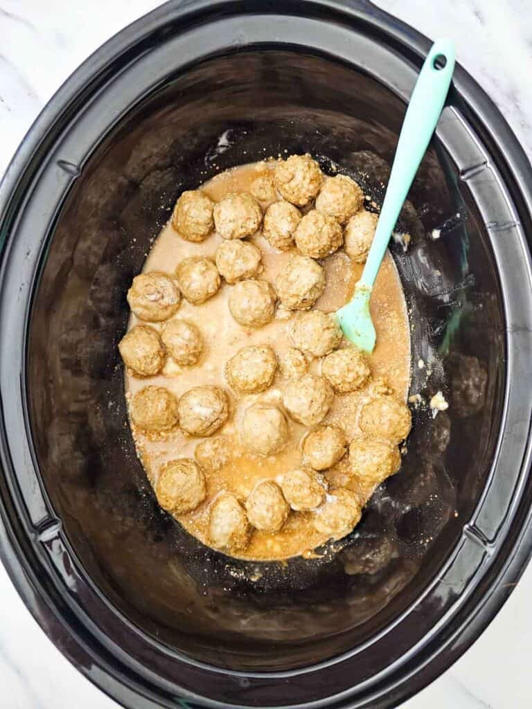 meatballs in gravy in a slow cooker