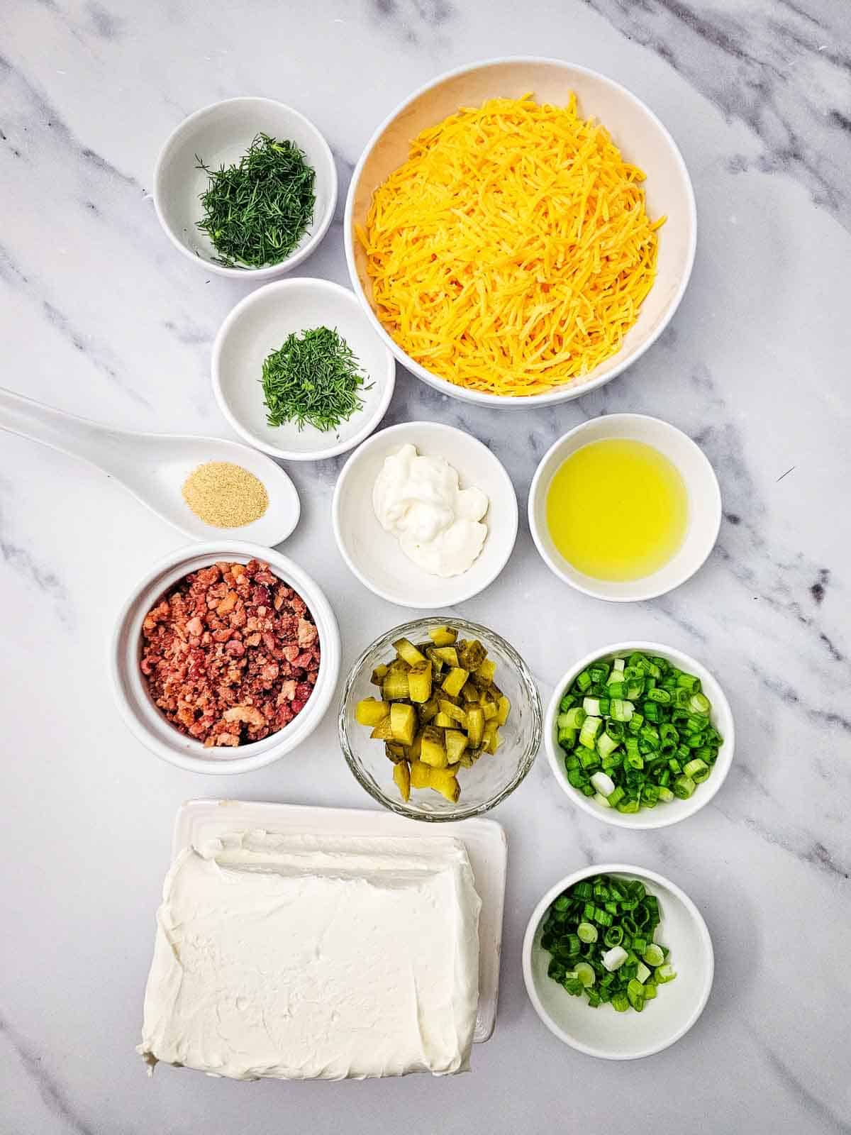 dill pickle cheese ball ingredients on the kitchen counter