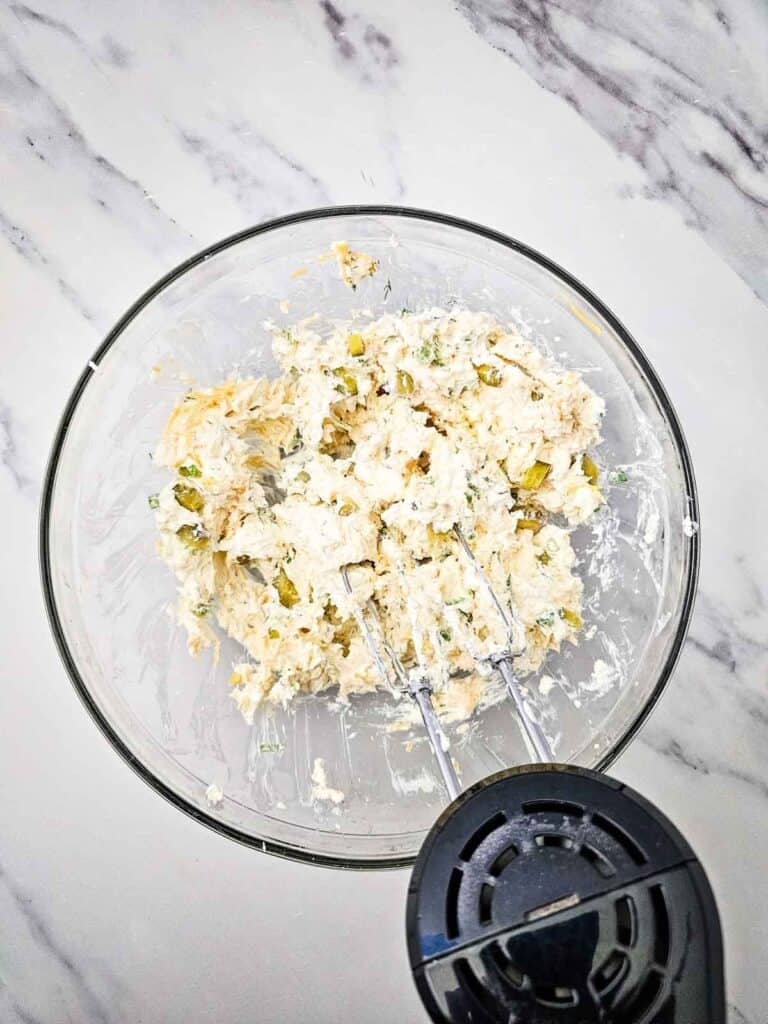 cheese ball mixture in a mixing ball