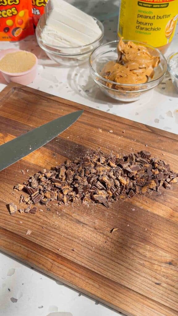 chopped peanut butter cups on a cutting board