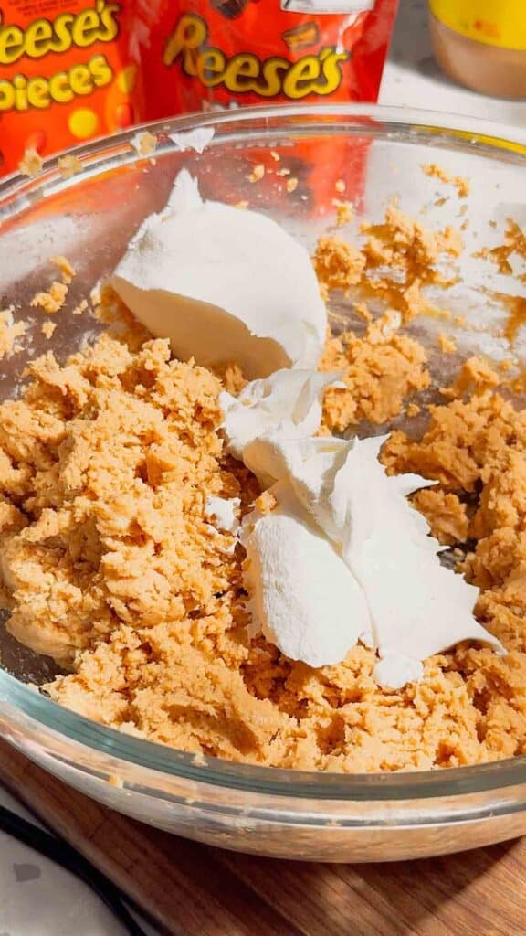 cool whip added to bowl with peanut butter cream cheese mixture
