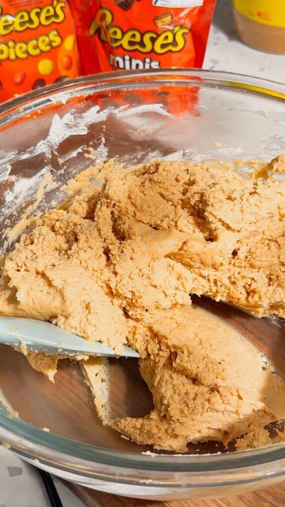 peanut butter cheesecake mixture in a mixing bowl