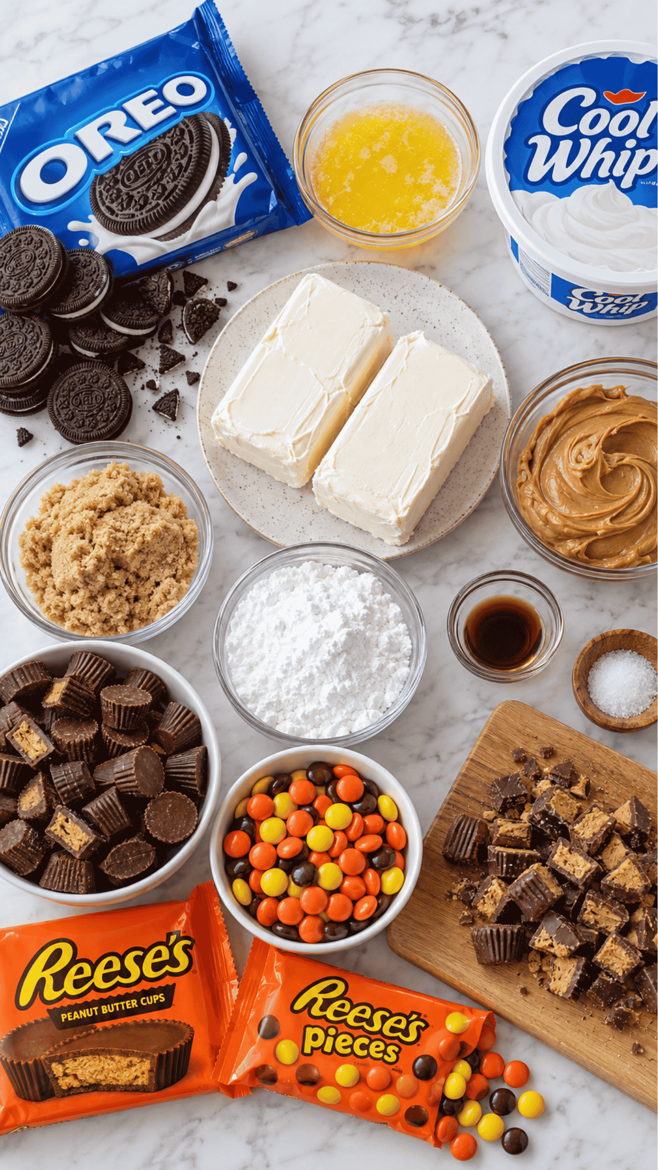 no bake loaded reeses cheesecake ingredients on the kitchen counter