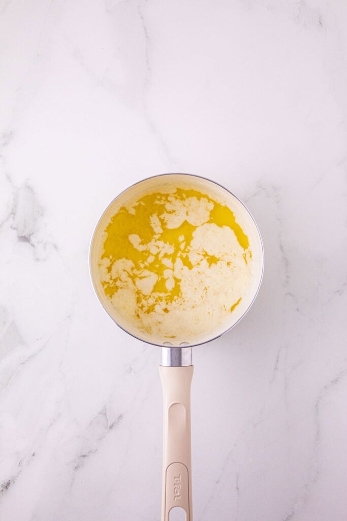 melted butter and minced garlic in a saucepan