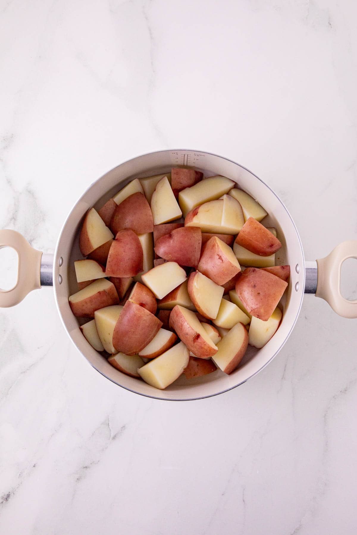 cubed potatoes in a large pot