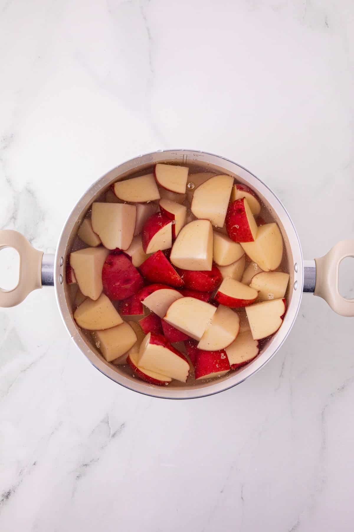 cubed red potatoes in a pot