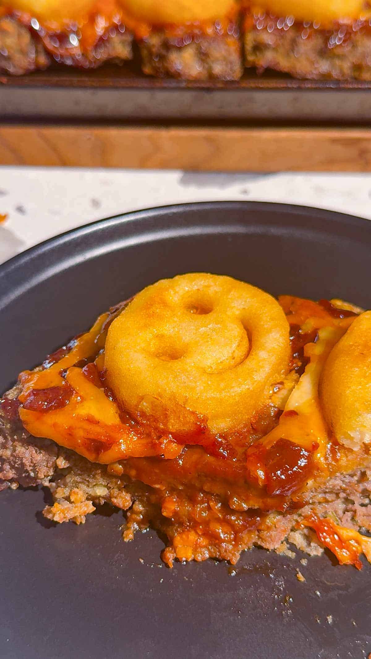 sheet pan meatloaf piece on a plate