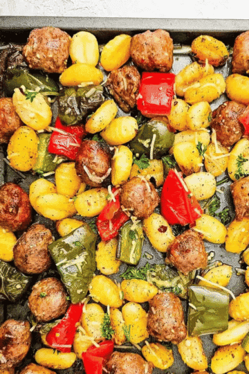 This Sheet Pan Sausage and Gnocchi recipe is an easy weeknight dinner made with Italian sausage, tender gnocchi, bell peppers, garlic, parmesan and simple seasonings all roasted together on one pan. If you need quick dinner ideas, sheet pan dinners, sausage recipes, gnocchi recipes, easy family meals or simple one pan meals, this hearty recipe is perfect. The gnocchi cooks up soft with lightly crisp edges while the sausage and peppers add tons of savory flavor. Great for busy nights, meal planning, comfort food dinners or when you want something filling without a sink full of dishes. Save this easy sheet pan sausage gnocchi dinner for a quick 30 minute meal everyone will love.