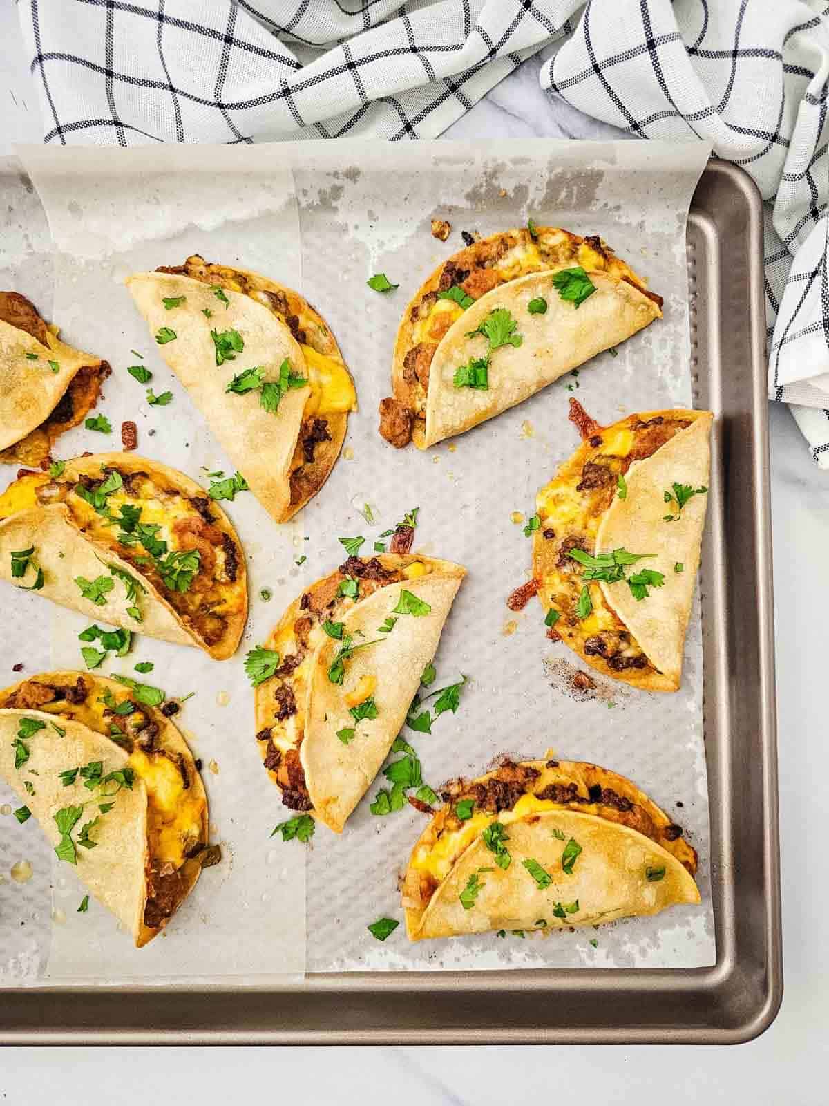 fresh chopped cilantro sprinkled on top of sheet pan tacos