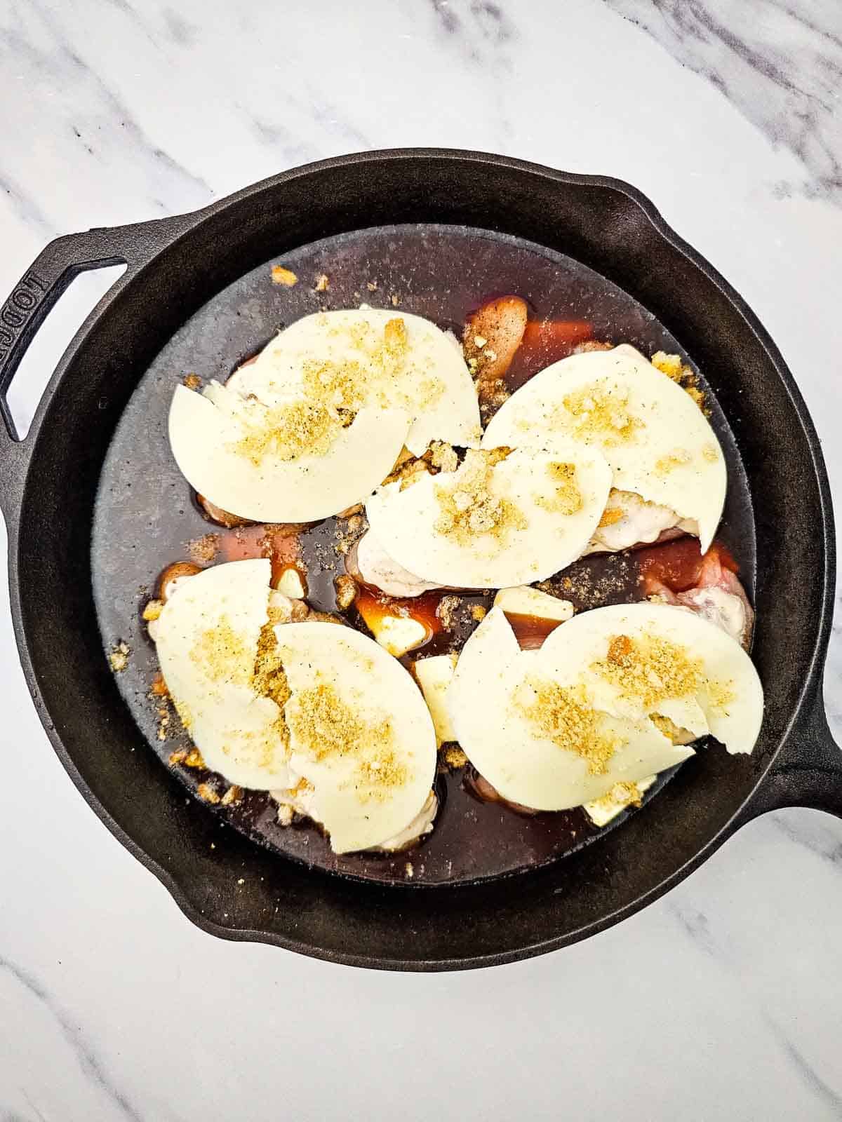 french onion chicken and rice in a skillet before cooking