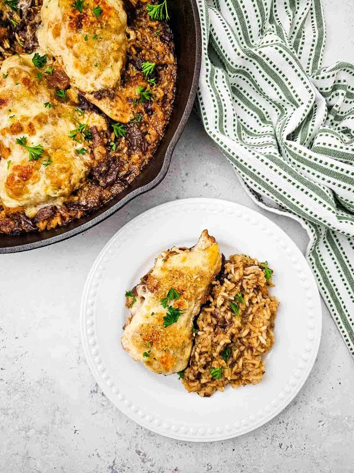 french onion chicken and rice served on a plate
