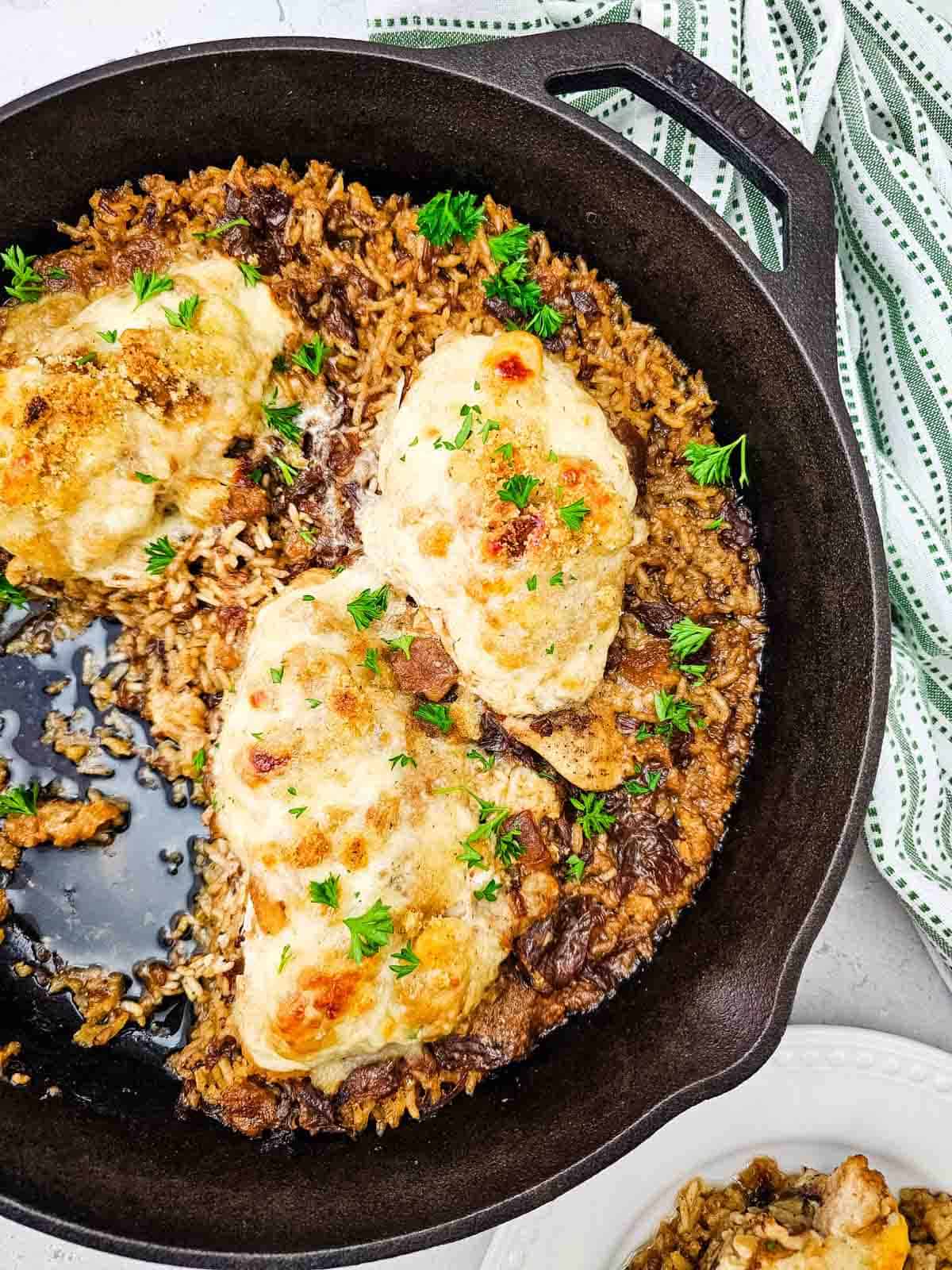 chicken and rice in a skillet