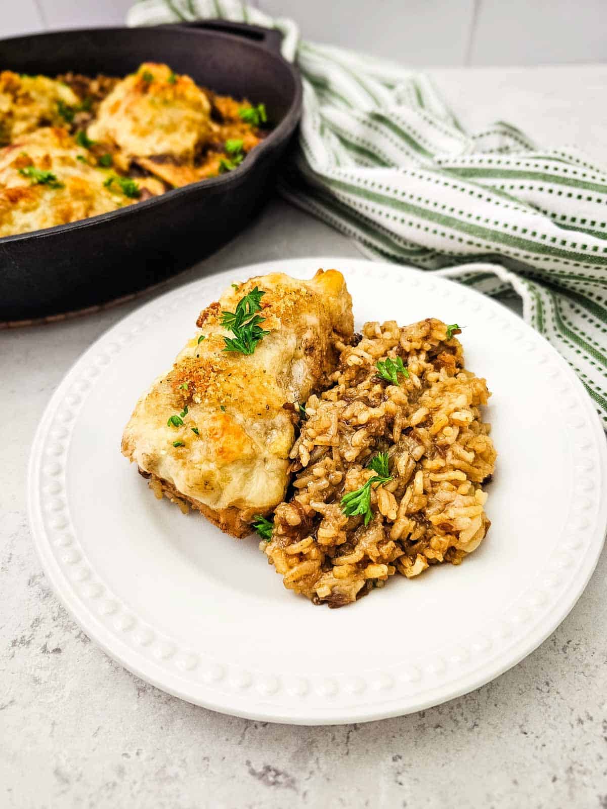 french onion chicken and rice on a plate