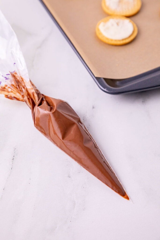 melted chocolate in a piping bag